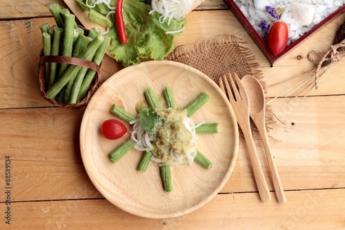 Green curry coconut milk with rice noodle.