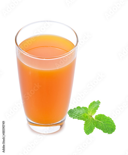 Orange juice and fresh mint on white background.