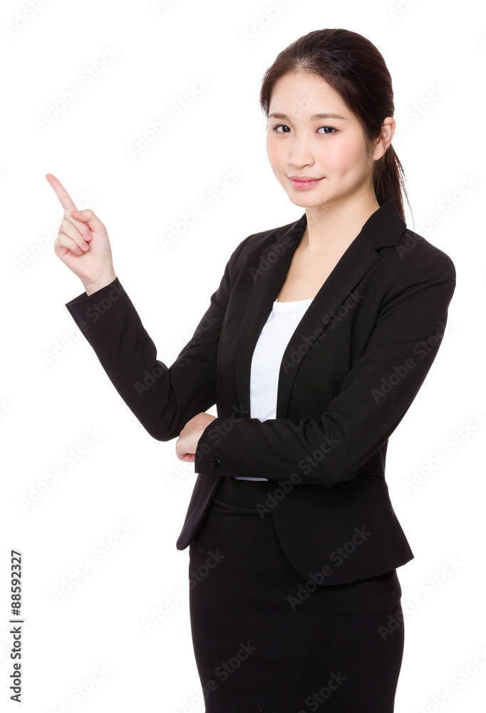 Asian young businesswoman with finger point up Asian young businesswoman with finger point up