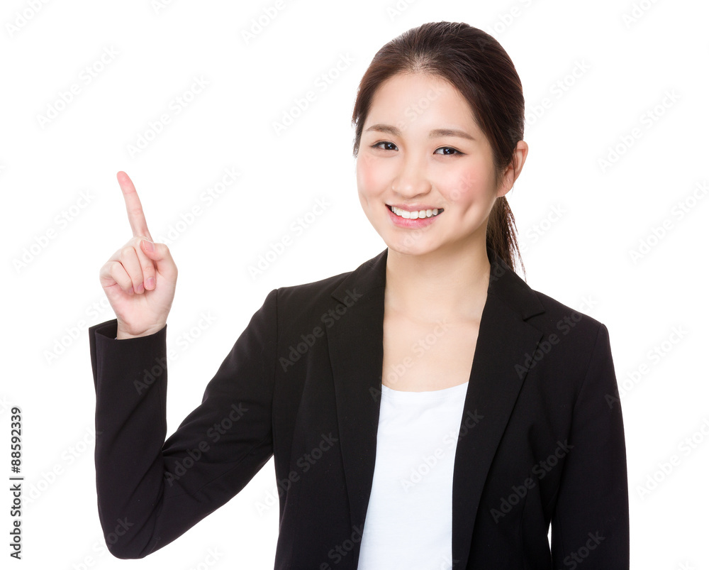 Asian businesswoman with finger showing up Asian businesswoman with finger showing up