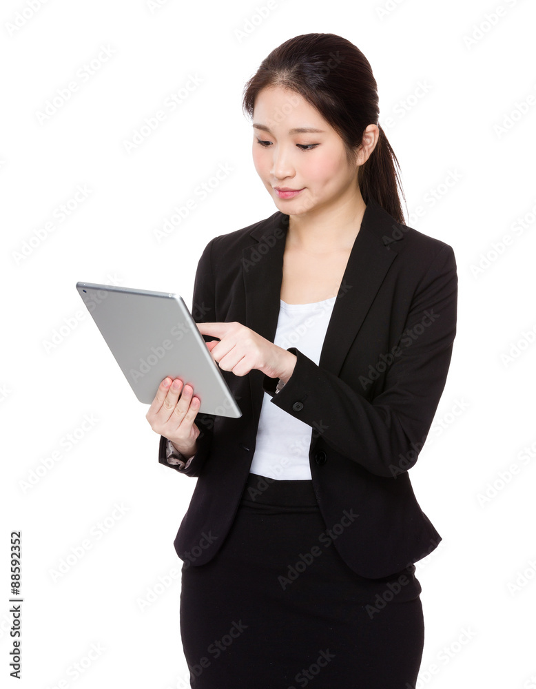 Asian young businesswoman use of tablet pc Asian young businesswoman use of tablet pc