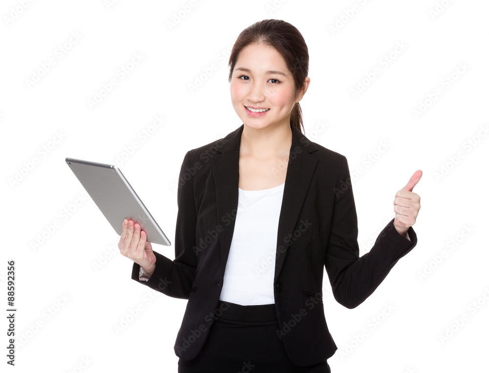 Businesswoman hold with tablet and thumb up Businesswoman hold with tablet and thumb up