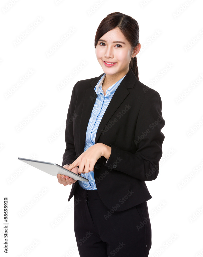 Young businesswoman use of the tablet pc Young businesswoman use of the tablet pc