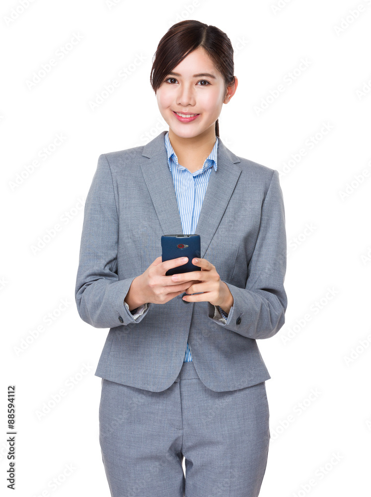 Young Asian Businesswoman use of the cellphone Young Asian Businesswoman use of the cellphone