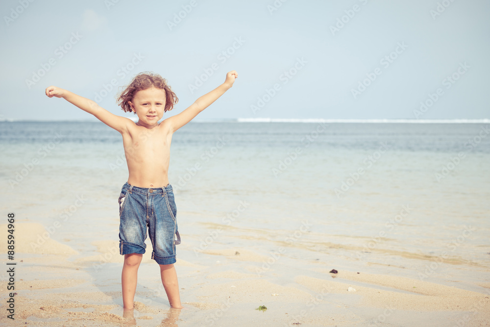 Portrait of little boy standing on the beach Portrait of little boy standing on the beach