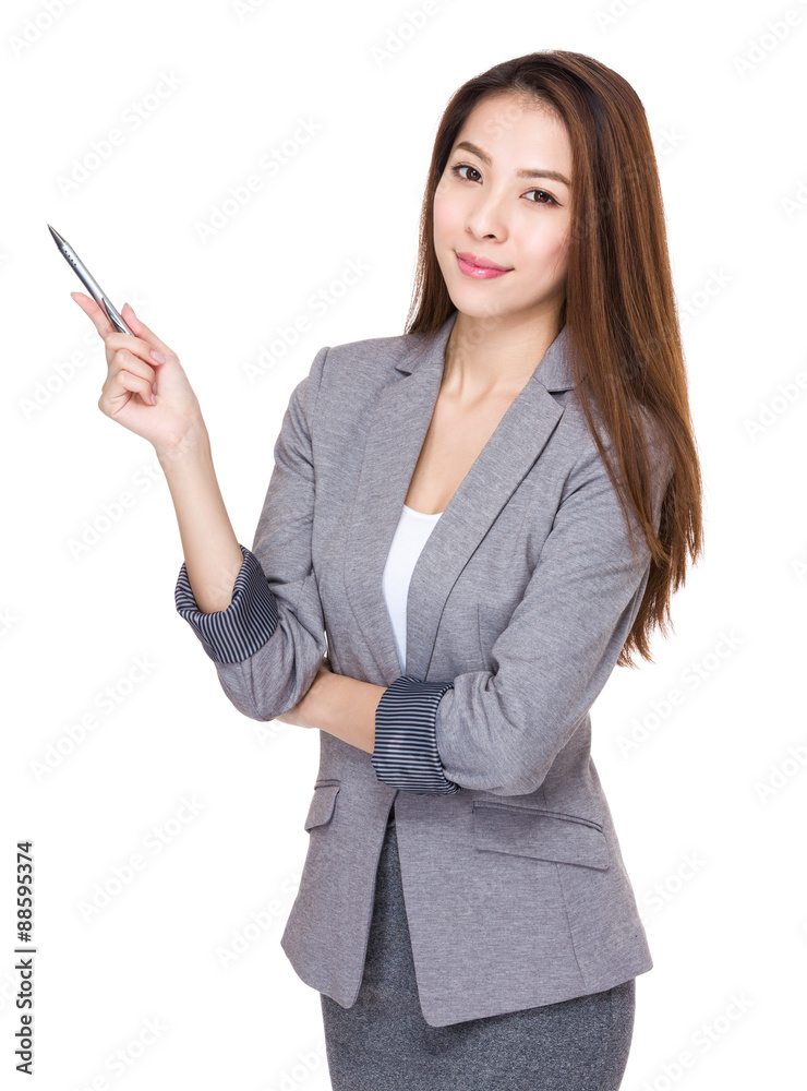 Young businesswoman with pen point up Young businesswoman with pen point up