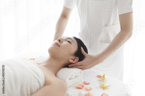 Women receiving head massage