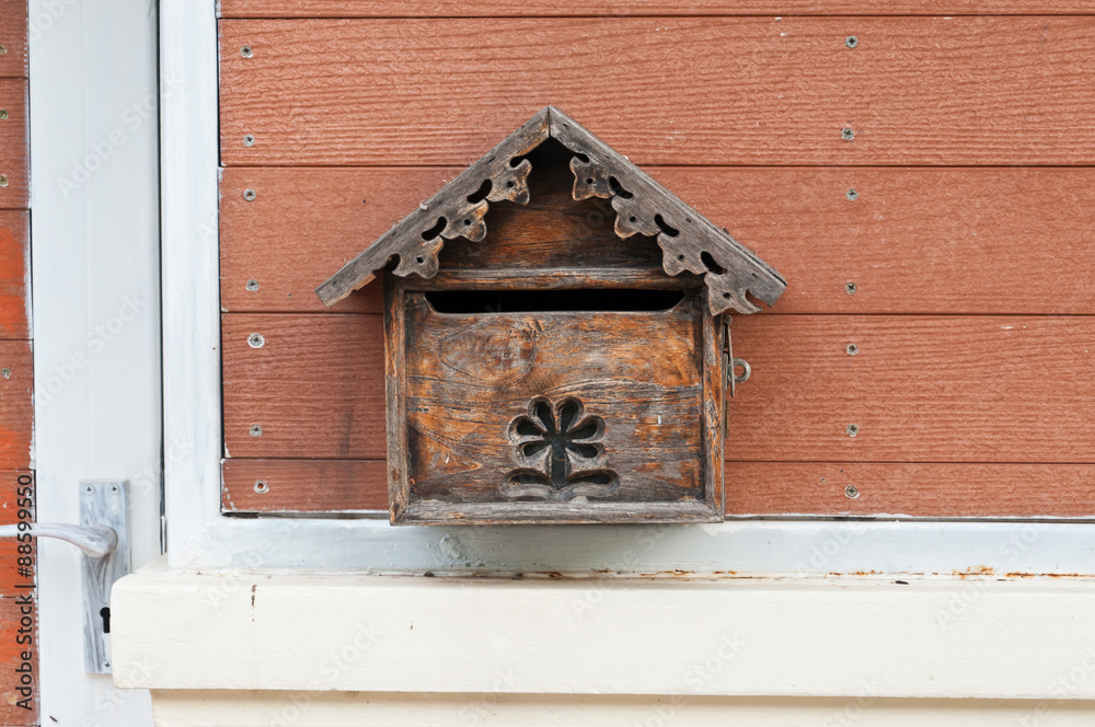 Wooden mail box on the wall. Wooden mail box on the wall.