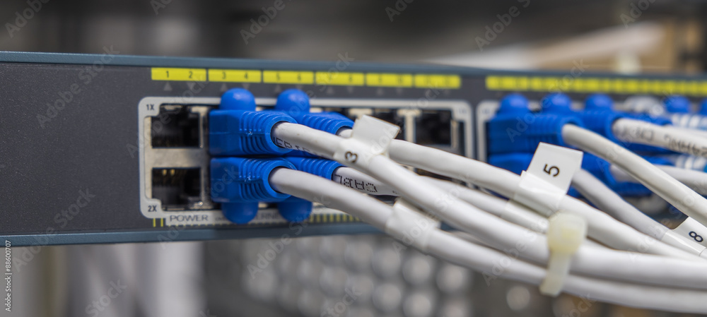 Utp Cable Switch Hub Router Lan utp cable plug in network switch Stock Photo | Adobe Stock