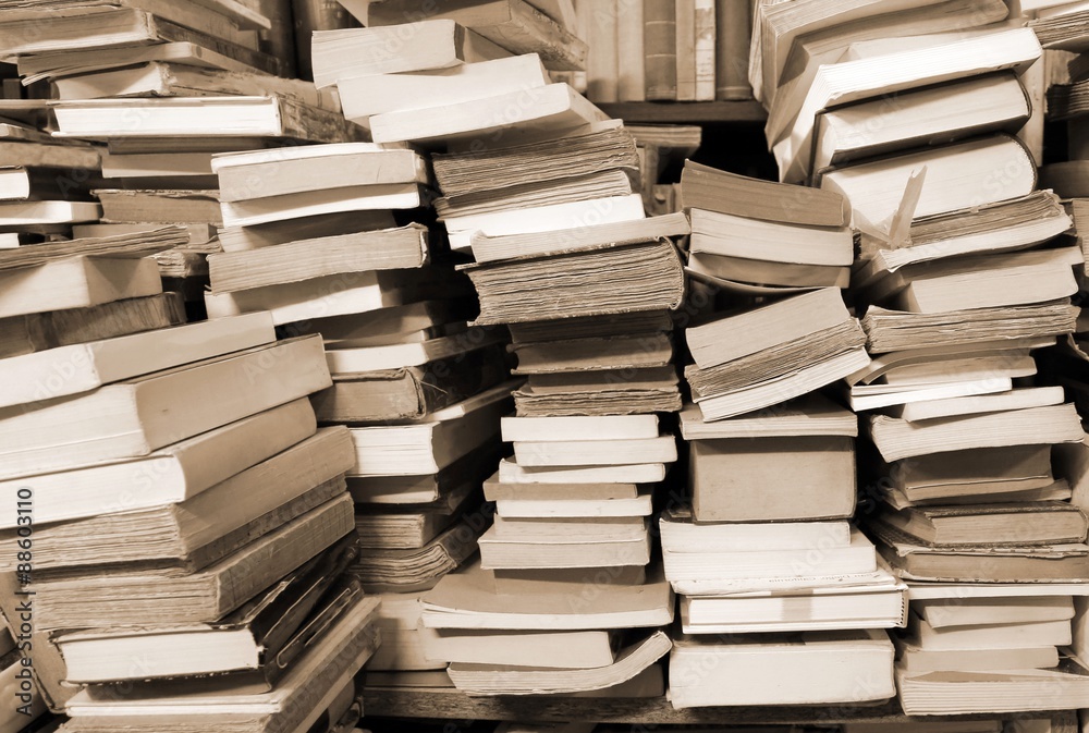 many books piled up for sale in the great library many books piled up for sale in the great library