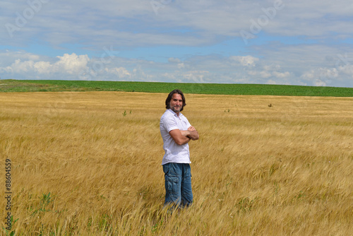 man stands on the rye field