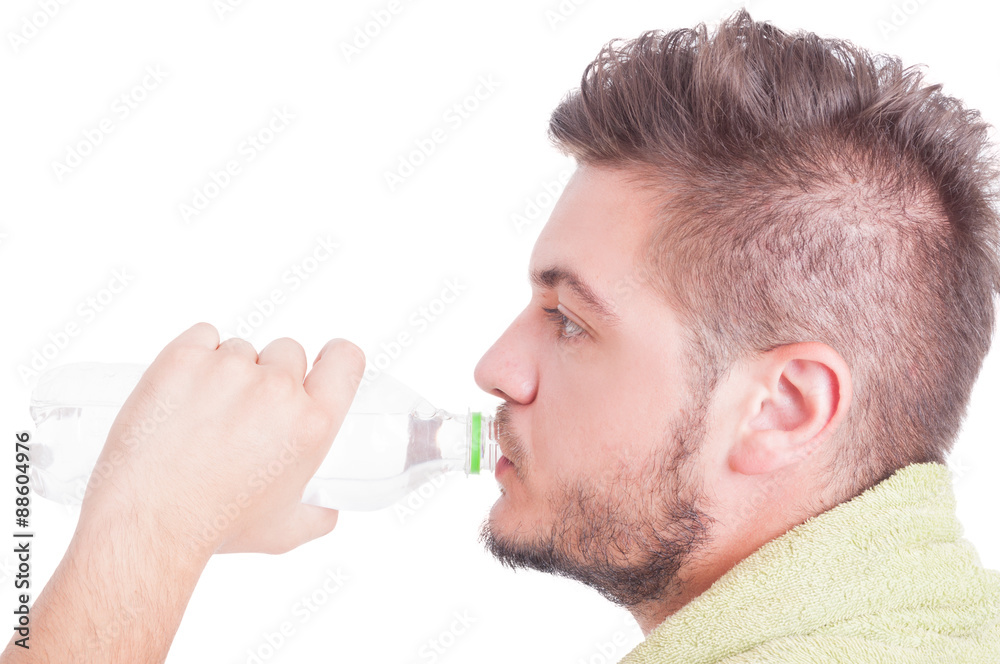 Summer dehydration concept with man drinking water Summer dehydration concept with man drinking water