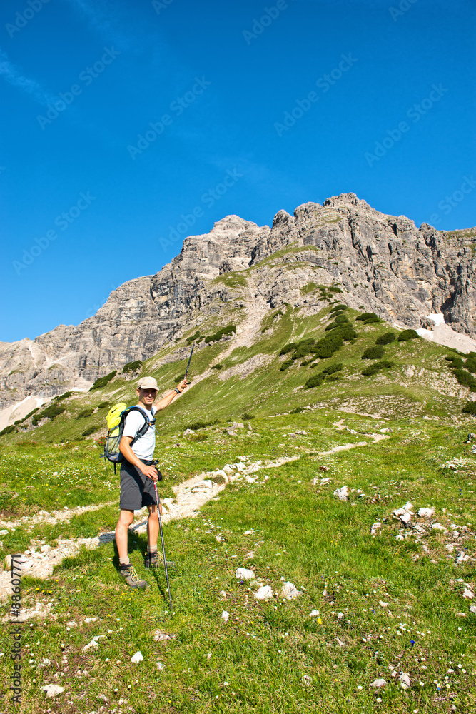 Male hiker in front of Hochvogel Mountain, Austria