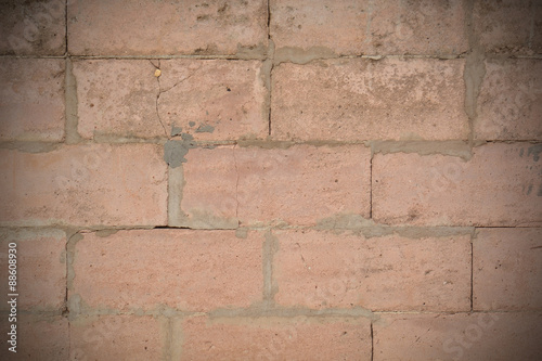 brick wall with cracks
