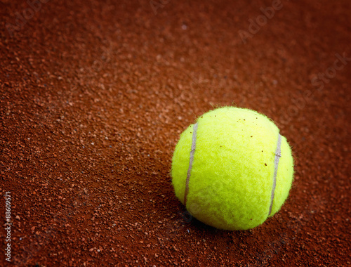 Tennis ball on the court closeup