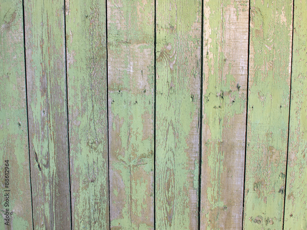 Fragment of a fence from wooden planks Fragment of a fence from wooden planks