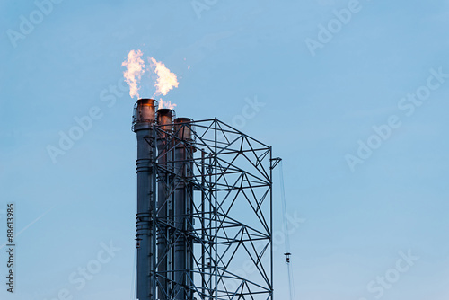 Flame burning on top of flare stack