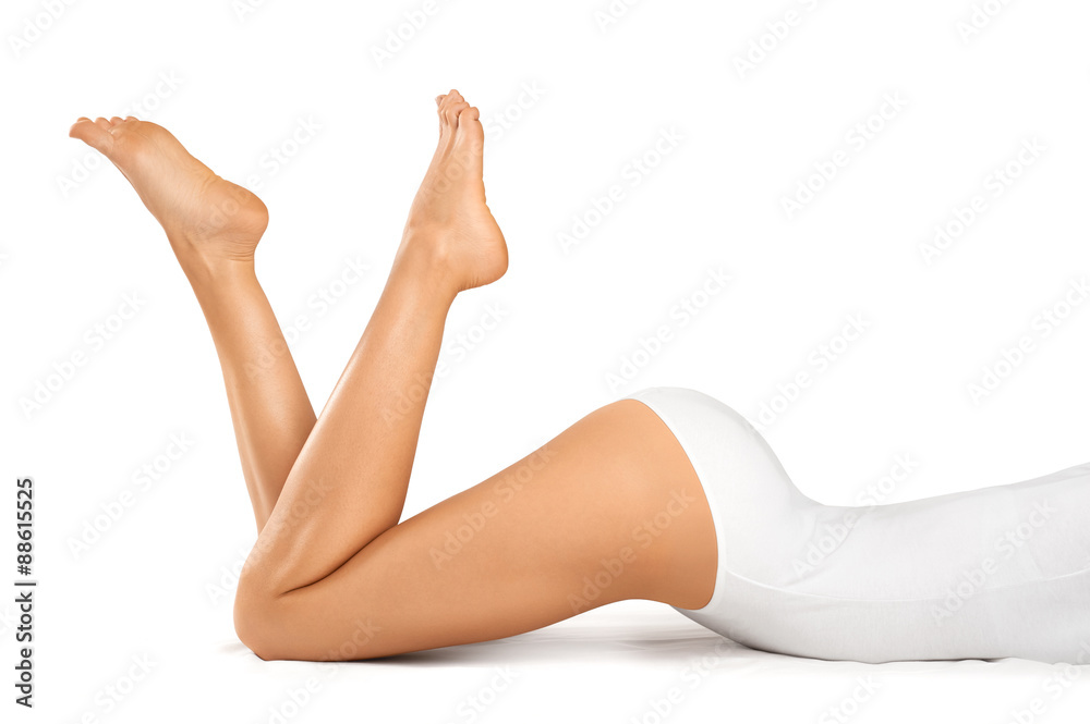 Beautiful woman legs on a white background.