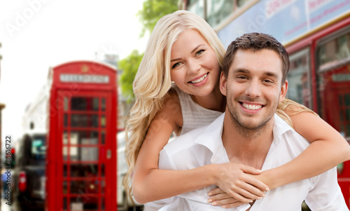Valokuva happy couple hugging over london city street