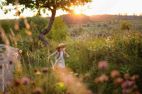child running through the forest