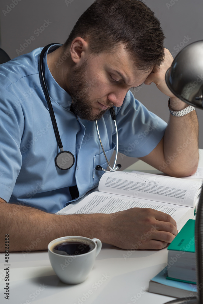 Doctor studying book Doctor studying book