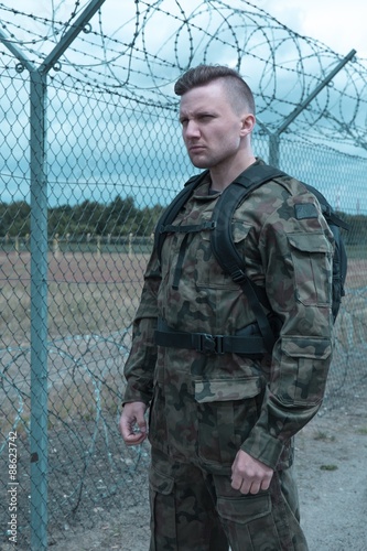 Soldier in military uniform