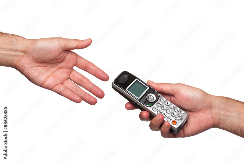 Close up of a hand passing a phone to another Close up of a hand passing a phone to another