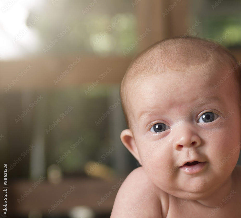portrait of cute baby girl at home