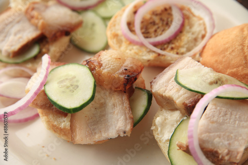 Small sandwiches of pork belly