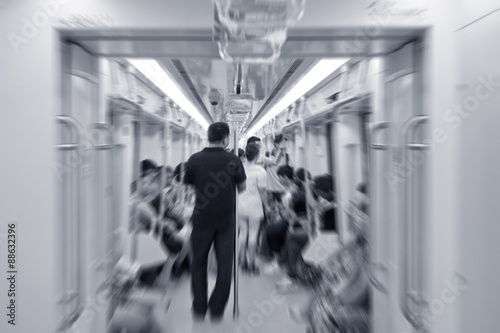 Passengers inside subway cars