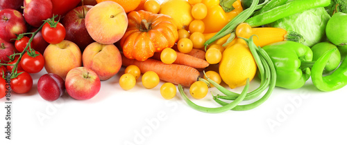 Heap of fresh fruits and vegetables isolated on white