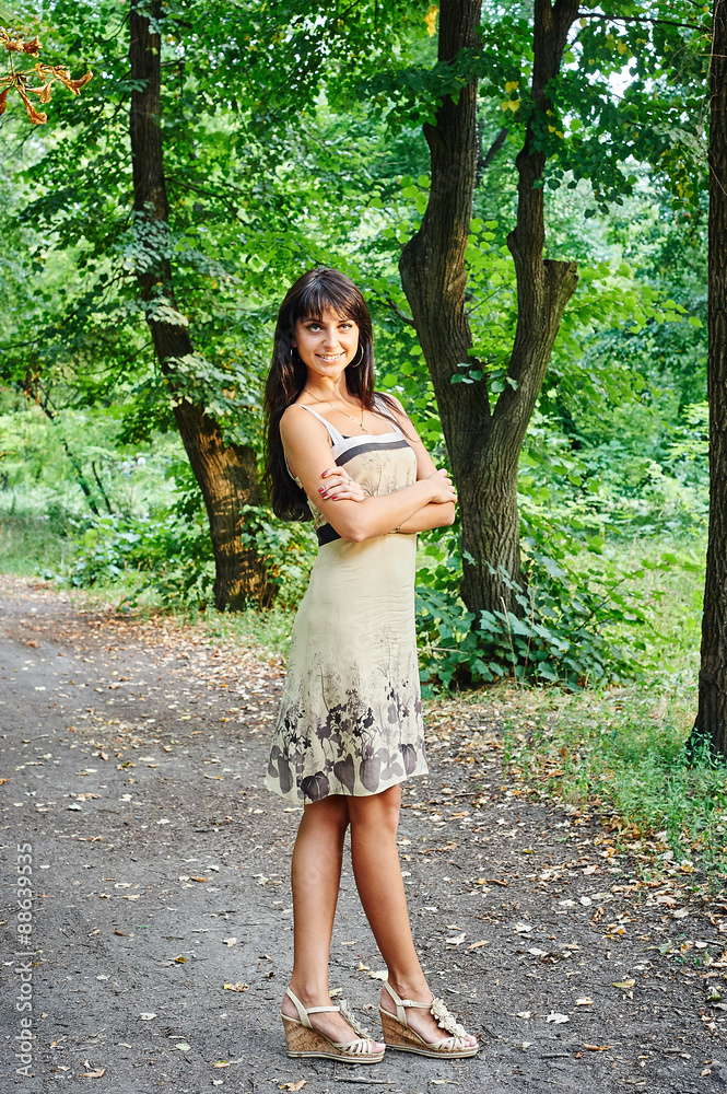 Portrait of a beautiful smiling woman in the park Portrait of a beautiful smiling woman in the park