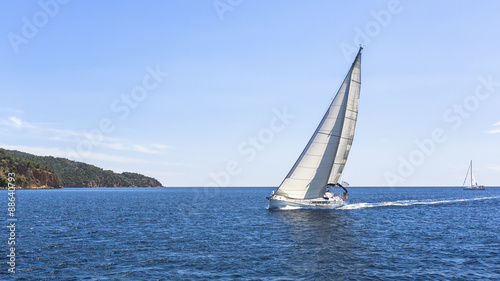 Sailing. Ship yachts with white sails in the Sea. Luxury boats. © De Visu