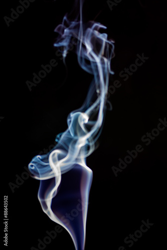 Colorful smoke abstract on black background