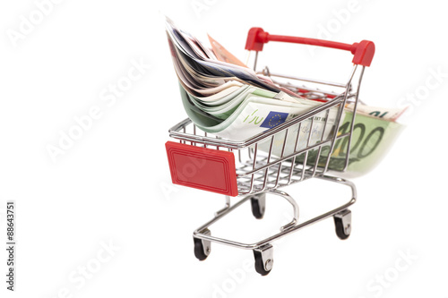 shopping cart full of euro banknotes isolated © yurchello108