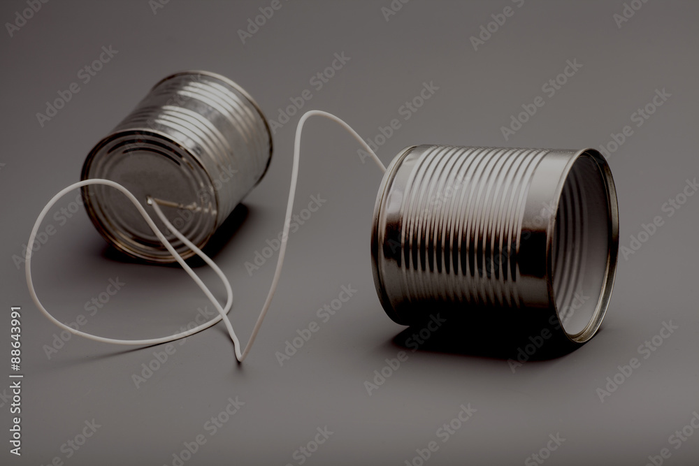 tin can phone.communication concept tin can phone.communication concept