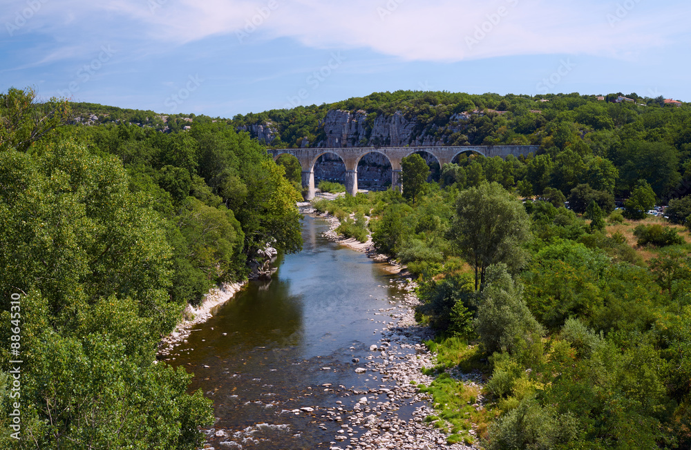Stone, Railway viaduct over the River Ardeche in France.