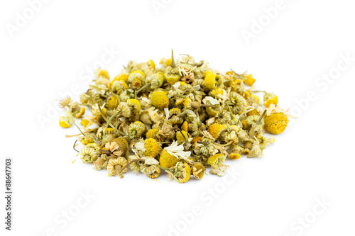 Heap of Loose camomile tea isolated on white background