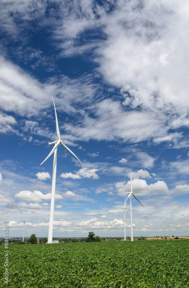 Wind turbines produce electricity Alternative energy with sky and cloud background Wind turbines produce electricity Alternative energy with sky and cloud background