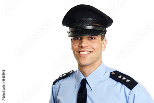 Fotografie, Obraz Usmíval se mladý policista na bílém pozadí, vlevo můžete psát nějaký text