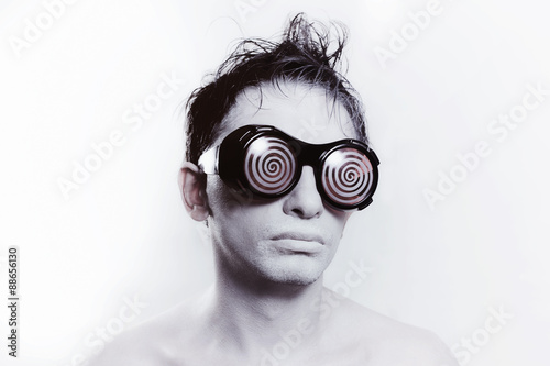 Fotobehang young man with white skin in strange glasses