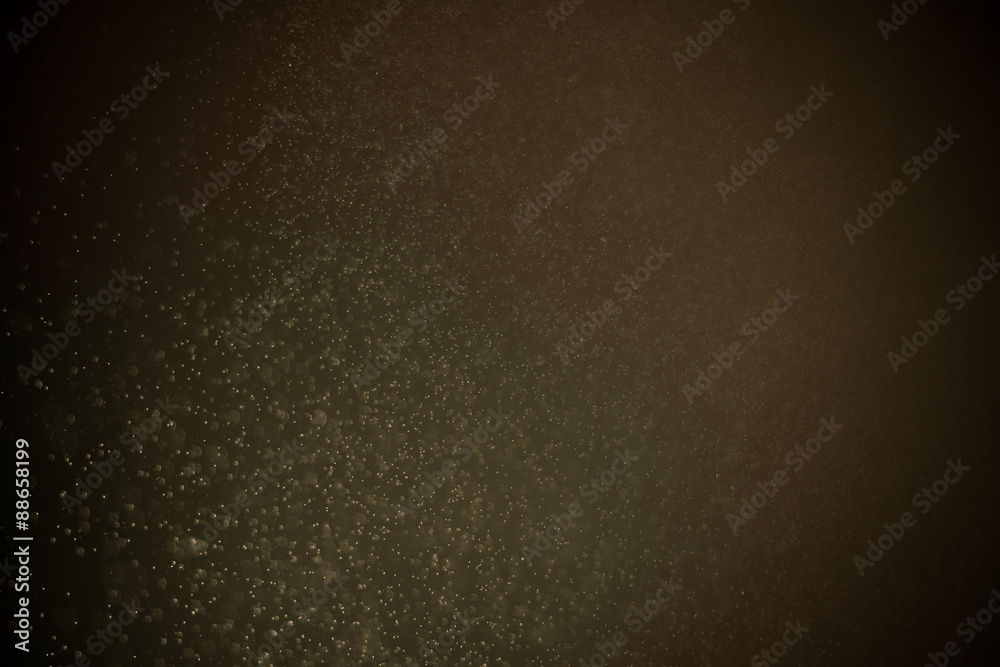 Obraz premium abstract dark bokeh lights background , defocused background, glowing galaxy