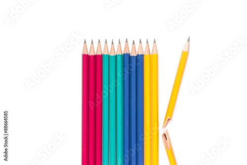 Pencils and Broken Pencil on white background photo