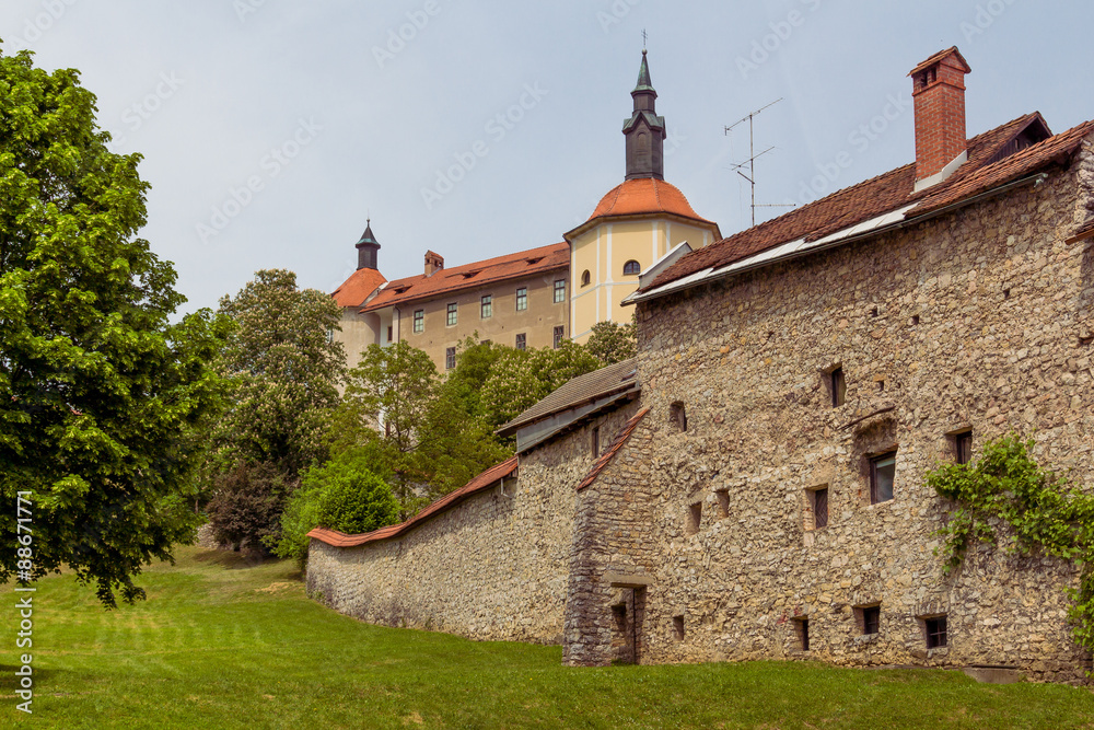 View of the Skofia Loka castle and its wall covered with greenery. View of the Skofia Loka castle and its wall covered with greenery.