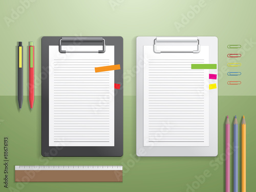 Blank notepad and office supplies