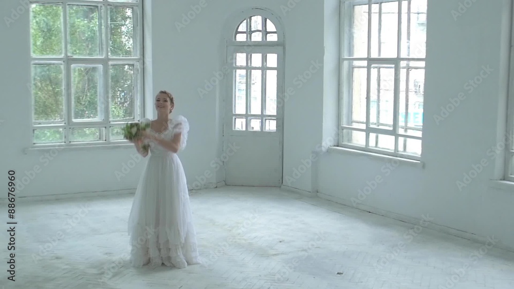 Beautiful girl in white dress throw up the bouquet, slow motion Beautiful girl in white dress throw up the bouquet, slow motion