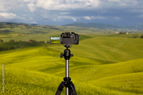 Dslr camera photographing Tuscany hills