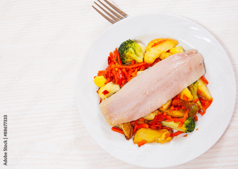 Fillet of fish with vegetables