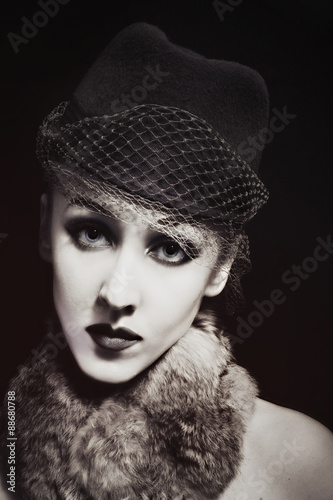 woman in hat with veil