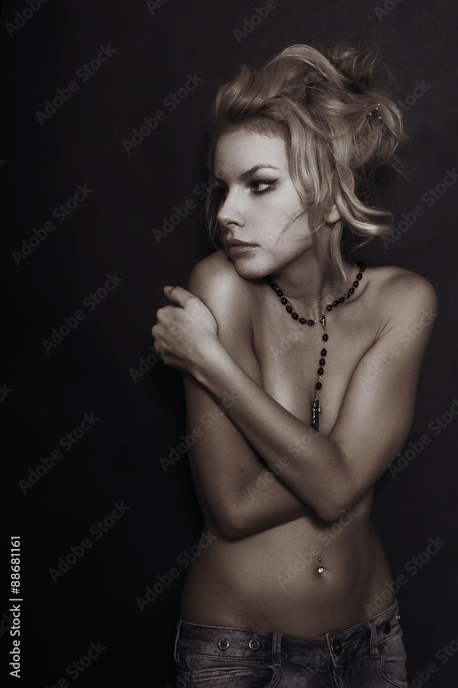 young beautiful nude blonde woman